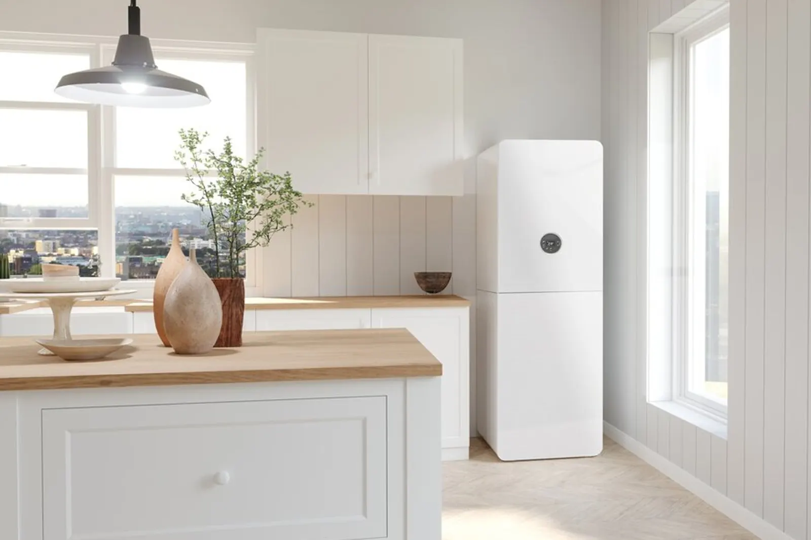Unité intérieure de pompe à chaleur air-eau installée dans la cuisine d'un pavillon